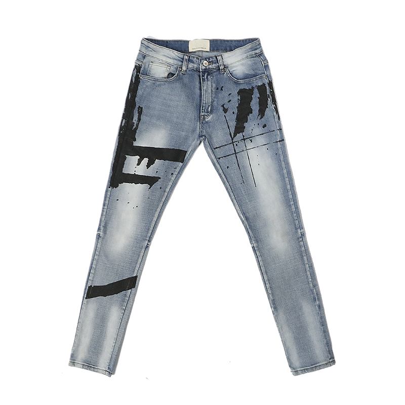 Graffititryckta Tvättade Och Slitna Slim-fit Jeans Med Små Fötter