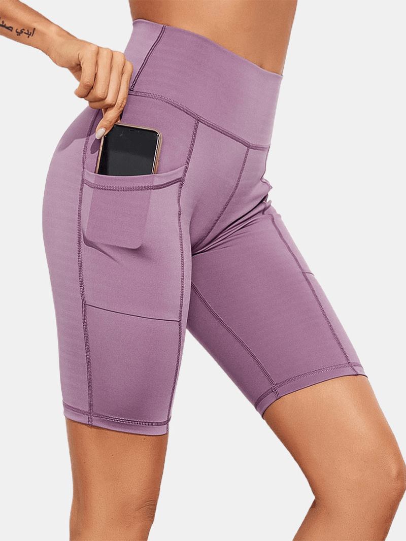 Enfärgad Ficka Slim Hip Lift Yoga Leggings